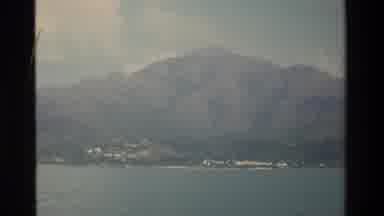 Hong Kong (1984): View On Mountains On The Shore And Sea From A Boat Swimming