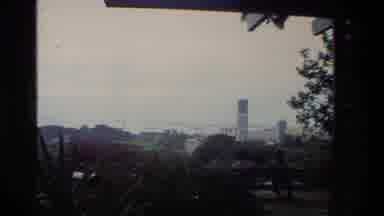 Thailand (1984): Overlooking A City Skyline From View Of Foliage Garden With Clip