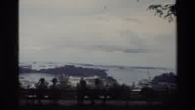 Thailand (1984): A Group Of People Looking Out Over A Ledge And A Beautiful Scenic