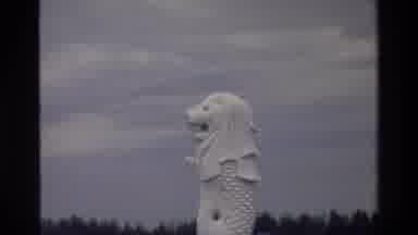 THAILAND-1984: Lion Statue Cloudy Man Fishing Net No Shirt