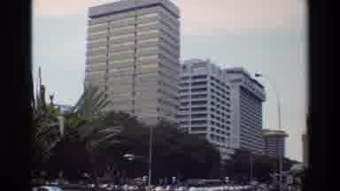 Thailand (1984): A View Of Skyscraper Buildings And Palm Trees