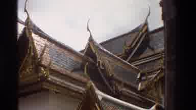 Thailand (1984): An Asian Building Overseas With Slanting Roofs And Art Work