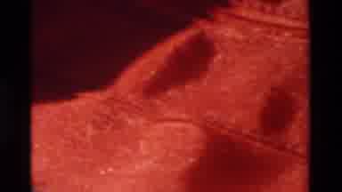 Thailand (1984): Up-Close Footage Of Red Fabric As Well As Passing Boat And What