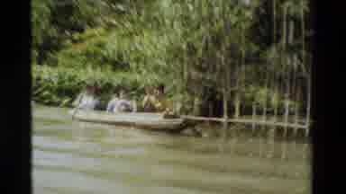 Thailand (1984): Views From A Motorboat Travelling Down River Including Men In A