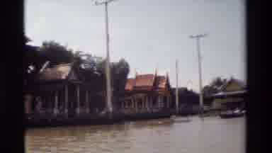 Thailand (1984): People Fishing In A Boat On The Lake Lots Of Houses In View