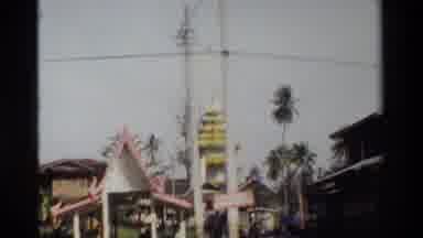 Thailand (1984): View Of Coastal Village And Building Spire On A Clear Sunny Day