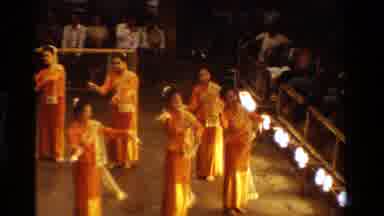 Thailand (1984): A Group Of Young Women In Yellow Dresses Dance In Front Of An
