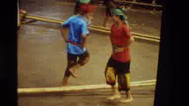 Thailand (1984): Group Of People Is Dancing A Traditional Style Dance With Bamboo