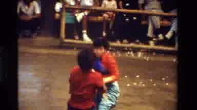 Thailand (1984): Asian Men Fighting With Swords While A Crowd Of People Watch