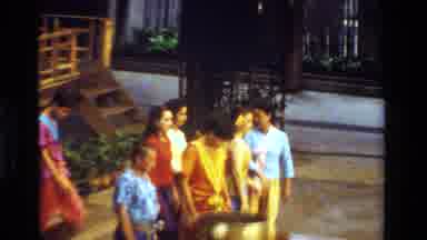 Thailand (1984): Monk Is Showing Young People Traditional Rituals In The Temple