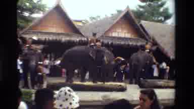 Thailand (1984): People Hanging Out In A Small Village Town Being Entertained By