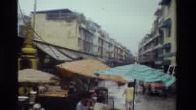 Thailand (1984): Blurry City Marketplace And Nearby Surroundings Being Flooded By