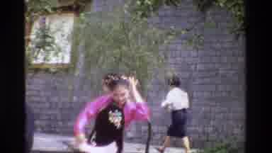 Thailand (1984): Woman Dancing With An Oriental Dress In A Square Near A Man