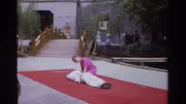 Thailand (1984): A Man Being Kung Foo Kicked And Knocked Out As A Woman In Pink