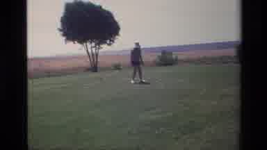 Laguna Hills California USA (1976): Footage Of A Golfer In A White Hat Hitting A