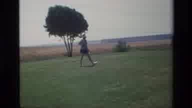 Laguna Hills California USA (1976): A Man And A Woman Tee Off At A Golf Course On