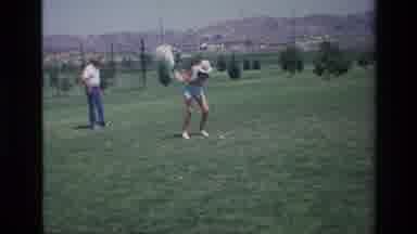 Laguna Hills California USA (1976): Man And Woman Swinging Golf Clubs And Hitting