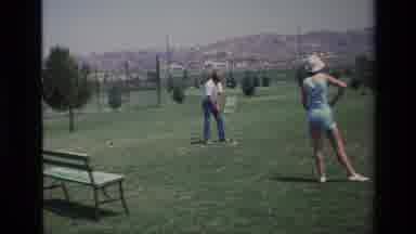 Laguna Hills California USA (1976): Man Playing Golf On The Field While Woman
