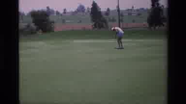 Laguna Hills California USA (1976): Man Preparing To Hit A Golf Ball On The Green