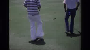 Laguna Hills California USA (1976): Man In Striped Shirt Putts Golf Ball Toward