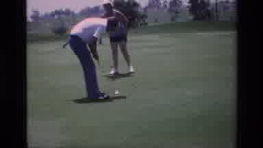 Laguna Hills California USA (1976): Man And Woman Golfing Man Sinks Short Putt On