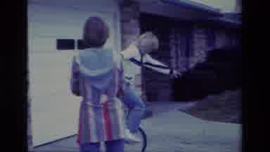 Aliso Viejo California USA (1977): Girl Tries To Ride Unicycle And Falls Off In