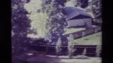 Big Bear California USA (1977): Snowy Cabin With Trees Covered In Snow With A Pool