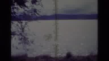 Big Bear California USA (1977): Grainy Video Of A Lakefront And Road From Shoulder
