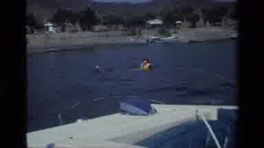 Canyon Lake California USA (1977): Person With Water Skies In Water Getting Ready