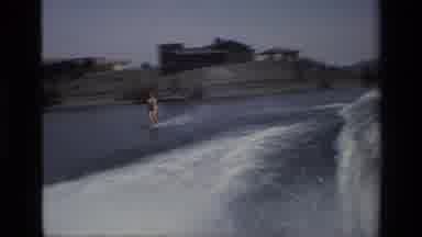 Canyon Lake California USA (1977): Rear Camera View Of A Boat Speeding Through The