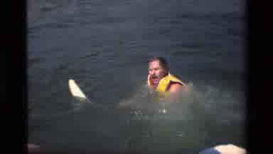 Canyon Lake California USA (1977): People Rescuing A Man In Trouble In The Water