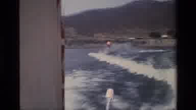 Canyon Lake California USA (1977): Speed Boat And A Water Skier Ski Behind It