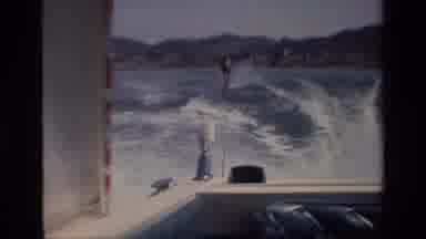 Canyon Lake California USA (1977): Speed Boat And A Water Skier Ski Behind It