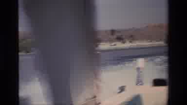 Canyon Lake California USA (1977): A Person Water Skiing From A Fast Boat On The