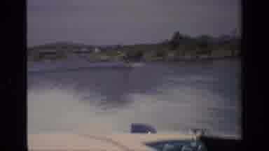 Canyon Lake California USA (1977): A Person Wake Boarding On River At Crazy Fast