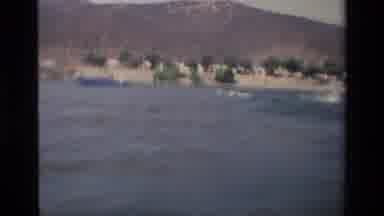 Canyon Lake California USA (1977): Old Man With A Life Vest On Boating Across A