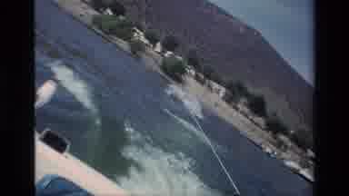 Canyon Lake California USA (1977): Person Riding Behind A Boat On A Board With A