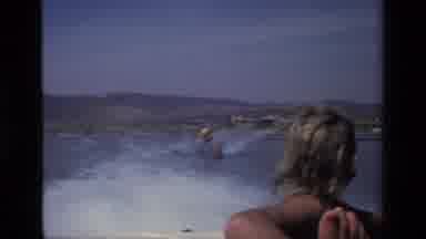 Canyon Lake California USA (1977): Water Skiing Show Boat On Lake Waters