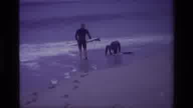 Laguna Beach California USA (1977): 2 People With Swim Suits And Surf Boards At