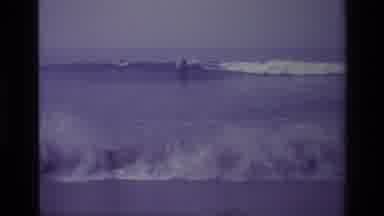 Laguna Beach California USA (1977): Two People Surfing The Waves At The Beach