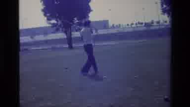 Laguna Beach California USA (1977): Young Woman Playing Golf Swinging Club Twice