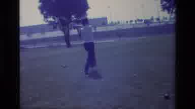 Laguna Beach California USA (1977): Woman Hitting Golf Ball With Golf Club And