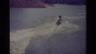 Lake Elsinore California USA (1977): Yellow Life Jacket Riding The Water Using A