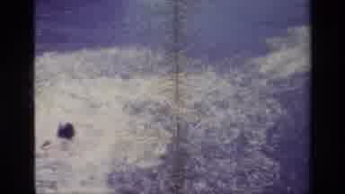 Lake Elsinore California USA (1977): Two Men In A River Swimming And Fishing