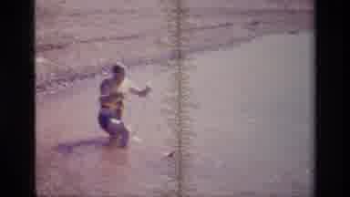 Lake Elsinore California USA (1977): Adults Having Fun Surfing In The Water