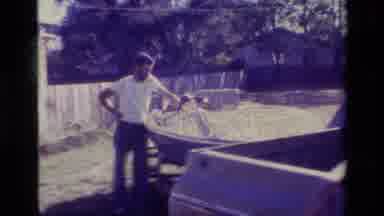 Lake Elsinore California USA (1977): Two Men Inside A Large Well-Kept Yard And