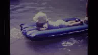 Canyon Lake California USA (1978): Boy And Father Playing In Lake During Summer