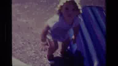 Canyon Lake California USA (1978): A Baby Playing At The River With Her Father