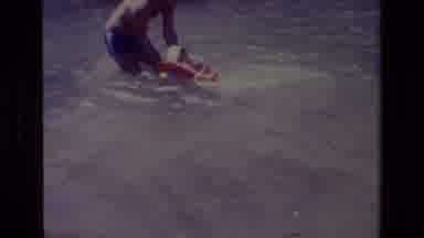 Canyon Lake California USA (1978): A Man Teach The Swimming To His Small Son