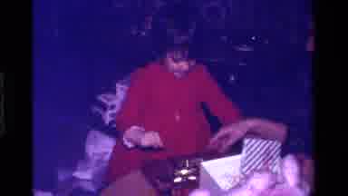 California USA (1979): A Little Girl In Red Dress Receiving A Present And Running